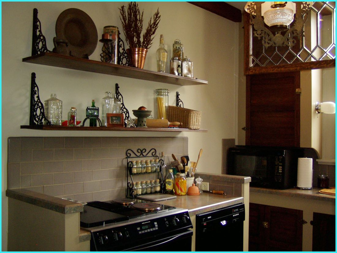 Kitchen with open shelving and corner window