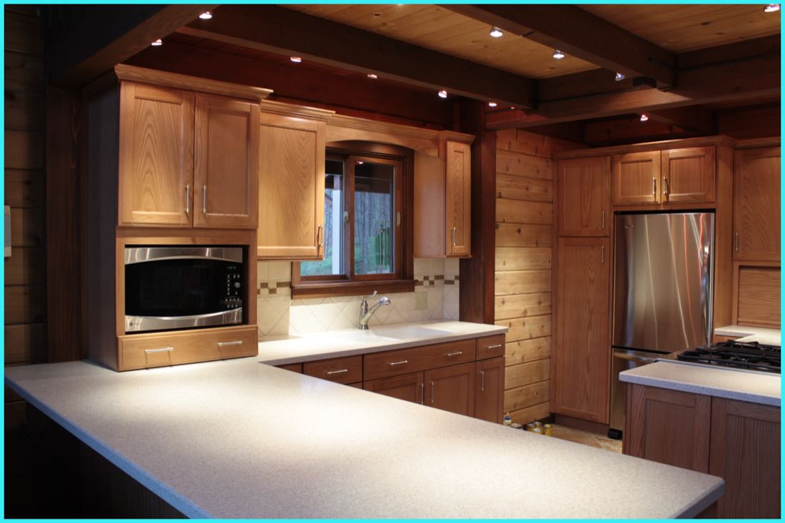Kitchen with island and wood cabinets